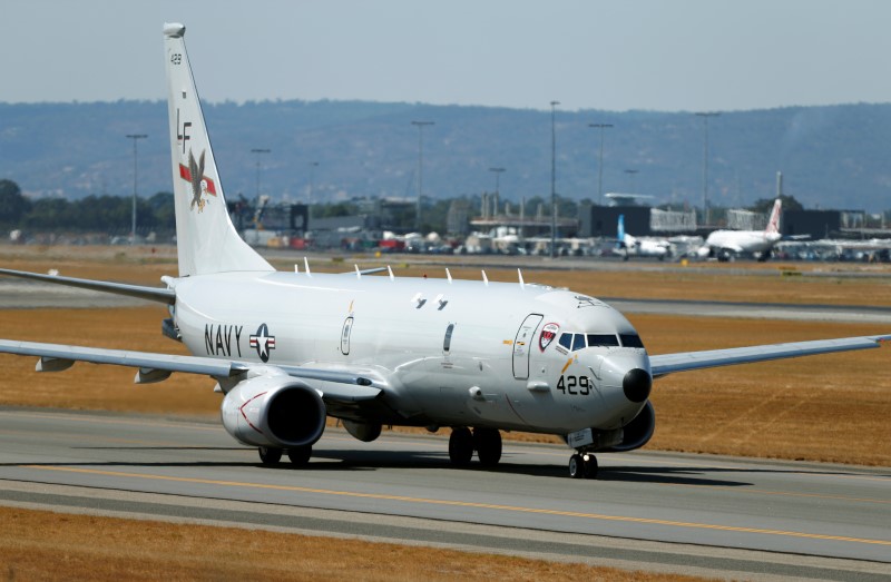 A U.S. Navy Poseidon P8 maritime surveillance aircraft taxis before taking off at Perth International Airport, March 28, 2014. REUTERS/Jason Reed